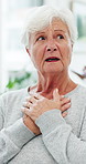 Chest pain, breathing and senior woman in clinic for checkup with lung infection, asthma or heartburn. Medical consultation, discomfort and elderly female patient with respiratory virus in office.