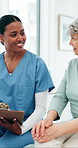 Nurse, old woman and smile with clipboard at hospital, notes or questions for medical report. Elderly person, healthcare professional and happy with wellness, checklist and consultation at clinic