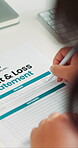 Writing, hands or person with document in office, company valuation or financial report for revenue. Income statement, track expenses or accountant with form for evaluation, investment loss or profit