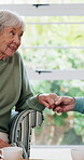Home, relax and old couple holding hands at tea party for talking, eating and retirement support. Love, senior people and biscuits in house with bonding, conversation or healthy marriage with loyalty