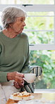 Home, relax and old couple eating at tea party for bonding, lunch break and retirement support. Beverage, senior people and biscuits in house for dessert, snack and healthy marriage with conversation