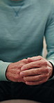 Worry, hands and senior man on sofa in home with nervous, stress or mental health in living room. Retirement, comfort and elderly male person with depression, anxiety or regret in house with emotion.