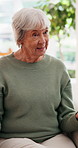 Conversation, relax and senior woman in home with gossip, catch up or discussion on weekend. Happy, calm and elderly female person in retirement with talking for communication in living room.