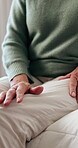 Arthritis, knee or old person in house with massage, joint pain or stiffness in leg movement. Retirement, ache or elderly woman in home with rub, inflammation and muscle stretching for tendinitis.