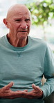 Sad, senior man and talking for counseling with grief, mourning loss and emotional support. Medical, discussion and elderly person with depression, patient crying and therapy session for past trauma