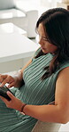 Business, woman and scroll in office with tablet, financial report and research for audit review. Female person, typing and check website in firm with digital tech, finance proposal and accounting.