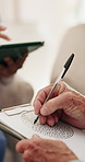 Clipboard, puzzle and hands of psychologist in office for mental health, conversation or assessment. Medical report, documents and therapist with notes on paperwork for counseling session in clinic.