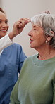 Senior, woman or brushing hair with nurse for assisted living, grooming or support in old age home. Female person, caregiver or helping patient for elderly care or nursing service in retirement house