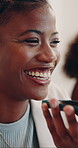 Business, phone call and black woman laugh in office for talking, communication and feedback for project. Creative, agency and happy person on cellphone for contact, speaker and funny conversation