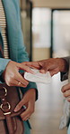 Hands, sanitary pad and share at office for menstruation with women, solidarity and care in workplace. People, period and giving with hygiene product, support or helping with friends at corporate job