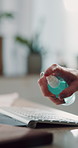 Hand, spray and wipe with keyboard in home for computer, sanitizer or germs for disinfection. Person, pc and bottle with cloth, liquid and cleaning dust, bacteria or virus with chemical at house