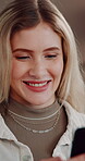 Laughing, woman and texting with phone in house, humor or communication with contact on social media. Reading, online and happy person with mobile for funny message, scroll and chat with tech in home