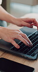 Creative, typing and hands with laptop on desk, self publishing and editing fiction novel on website. Author, home and person with keyboard for ebook, remote work and story submission with technology