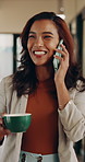 Woman, happy and phone call with coffee cup in office, hallway and contact at media company. Person, smile and mobile communication with consulting, drink or insight with talk at creative agency