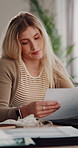 Tired, student and woman with document in house, sleepy and studying for assignment with low energy. Reading, paperwork and person with fatigue in home, education and unhappy with academic pressure