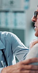 Shoulder pain, doctor and old man in hospital, consultation for recovery and conversation for diagnosis. Medical service, professional and patient in clinic, checkup and appointment for joint injury