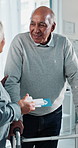 Medicine, old couple and doctor in hospital, tablet and consultation for recovery. Pensioner, medical service or person with disability, discussion for tablets or treatment for joint injury or health