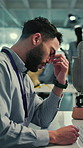 Prosthetic leg, headache and man in lab, fatigue or bionic anatomy innovation with robotics. Science, programmer or person in workplace, tired or migraine with burnout, tension or blue light exposure