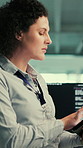 Woman, programmer and reading with tablet in office for research, server update and coding. Female person, digital and programming for encryption, testing software and IT inspection for maintenance