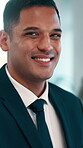 Confident, face and businessman with smile in office, ambition and wealth manager with career growth. Corporate, financial advisor and person with pride for investment, happy and business in Pakistan