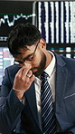 Businessman, headache and stock market with stress for crash or financial loss in office. Frustrated, man or broker with migraine or anxiety for bankruptcy, debt or trading mistake in workplace