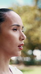 Fitness, tired and woman outdoor in nature for fresh air, recovery and wellness with environment. Exercise, workout and female runner in park for rest, breath and athlete training or thinking