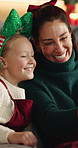 Christmas, mom or daughter in living room with selfie, healthy relationship or digital post at xmas celebration. Love, woman or child with laugh, family connection or memory capture in festive season