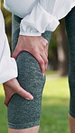Fitness, woman and hands with massage for knee pain, sports injury or medical problem from exercise. Outdoor, runner and person with joint inflammation, muscle strain or accident from intense workout