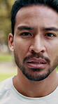 Fitness, tired and face of asian man outdoor in nature for breathing, recovery and wellness. Exercise, intense workout and male runner in park for rest, serious portrait and athlete training