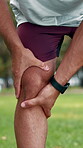 Fitness, man and hands with accident for knee pain, sports injury or medical problem from exercise. Outdoor, runner or person with joint inflammation, muscle strain or discomfort from intense workout