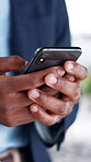 Businessman, hands and text message in office with phone, draft email or website for financial news. Person, typing and tech in agency with online chat, notification or mobile app for finance article
