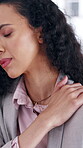 Businesswoman, stress and hurt in office with shoulder pain, inflammation and symptoms for work burnout. Tired, person and employee in workplace with bad posture, injury or fatigue from fibromyalgia.