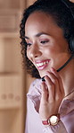 Smile, speaking and woman with headset in call center, troubleshooting advice and assistance hotline. Problem solving, talking and agent with tech support instructions, customer service and help desk