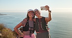 Girl, hiking and friends with selfie on mountain by ocean, memory and happy for web post on cliff. Women, smile and outdoor for hug with photography, profile picture or social media with trekking
