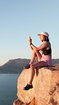 Woman, hiking and photography with phone in nature for travel, social media post and scenery. Female person, mobile and capture view with space, profile picture update and adventure memory on cliff
