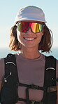 Arms crossed, hiking and sunglasses with woman outdoor at ocean for adventure, hobby or travel. Backpacking, smile and face of hiker person in nature to explore for discovery, fitness or trekking