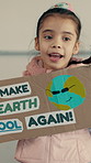 School, poster and child in class for climate change, conservation and global warming. Presentation, academy and girl with sign for earth day, education and oral assessment for eco friendly lesson