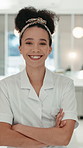 Happy woman, face and pastry chef with confidence in bakery for culinary skill or dessert. Portrait, female person or baker with smile or arms crossed for small business management in kitchen or cafe