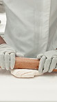 Chef, hands and rolling pin with dough, cooking job and preparation for baking bread in restaurant. Baker, person and equipment in diner kitchen with ingredients, sourdough recipe and culinary skill.