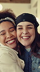 Smile, friends and women hug at cafe for greeting, reunion and bonding together with support. Girls, happy and embrace in coffee shop for connection with love at hangout, care and excited for meeting