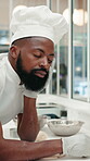 Tired, black man and chef sleeping in kitchen for hospitality, baking or catering burnout for fatigue. Overworked, restaurant baker or exhausted person with dough for pastry preparation, dream or nap