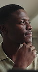 Thinking, tablet and black man on sofa in home with communication, social media or reading blog. Digital technology, ideas and African person in living room for texting on app for contact in house.