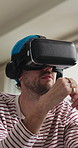 Touch, home and man with virtual reality glasses for cyberspace, metaverse and digital entertainment. Apartment, touch and person with vr headset for interactive ui, streaming and futuristic website