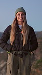 Nature, backpacking and face of woman on mountain for outdoor hiking, adventure or fitness on holiday. Travel, portrait and person trekking for exercise, hobby or health on vacation or weekend trip.