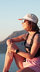 Hiking, relax and woman with fitness, thinking and adventure with sunshine, wellness and holiday. Outdoor, hiker and person with summer break, happiness and trekking for health benefits or reflection