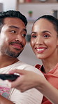 Remote, laugh or couple watching tv in home, funny conversation or streaming movie for weekend break. Smile, comedy film and people with series discussion in apartment, support and bonding together