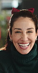 Face, woman and laugh in home with Christmas, funny tradition and satisfaction for xmas celebration. December, mature person and happy in living room with humor, festive season and Christian holiday.