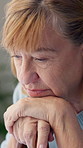 Sad, thinking and old woman in home, anxiety and mourning for grief, lonely and contemplation. Reflection, stress or elderly person with depression, mental health or retirement with reaction or tired