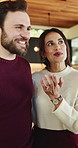 Talking, planning and couple in home with interior design ideas, renovation and decoration. Marriage, happy and man with woman embrace in conversation for change, remodeling and house improvement