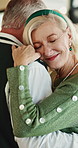 Dancing, smile and senior couple in home with music, playlist or radio for bonding together. Happy, groove and elderly man with woman for album with rhythm in living room for romance in apartment.